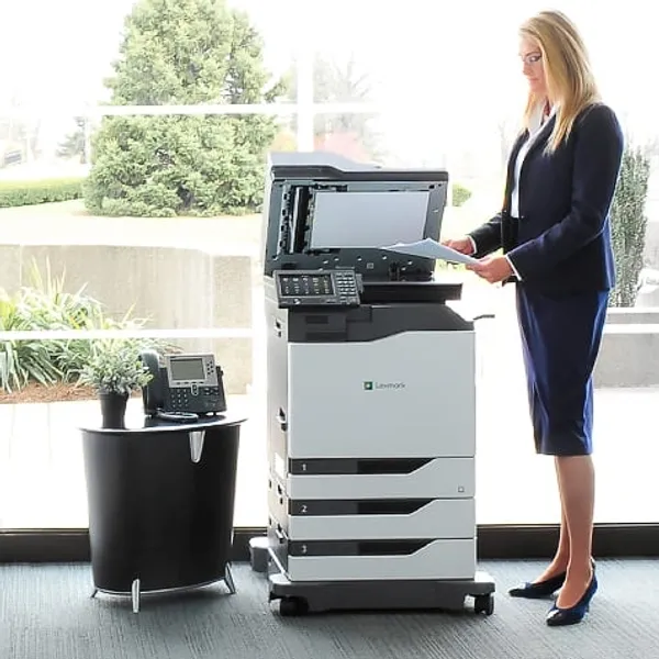 Secretary using the Lexmark XC6152 printer
